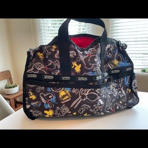 NWOT black Le Sportsac Peanuts-print weekender bag